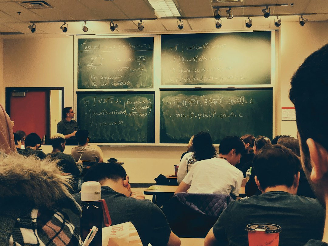 Undergraduate students studying in a shared academic workspace; illustrative image, not an Air University campus photograph
